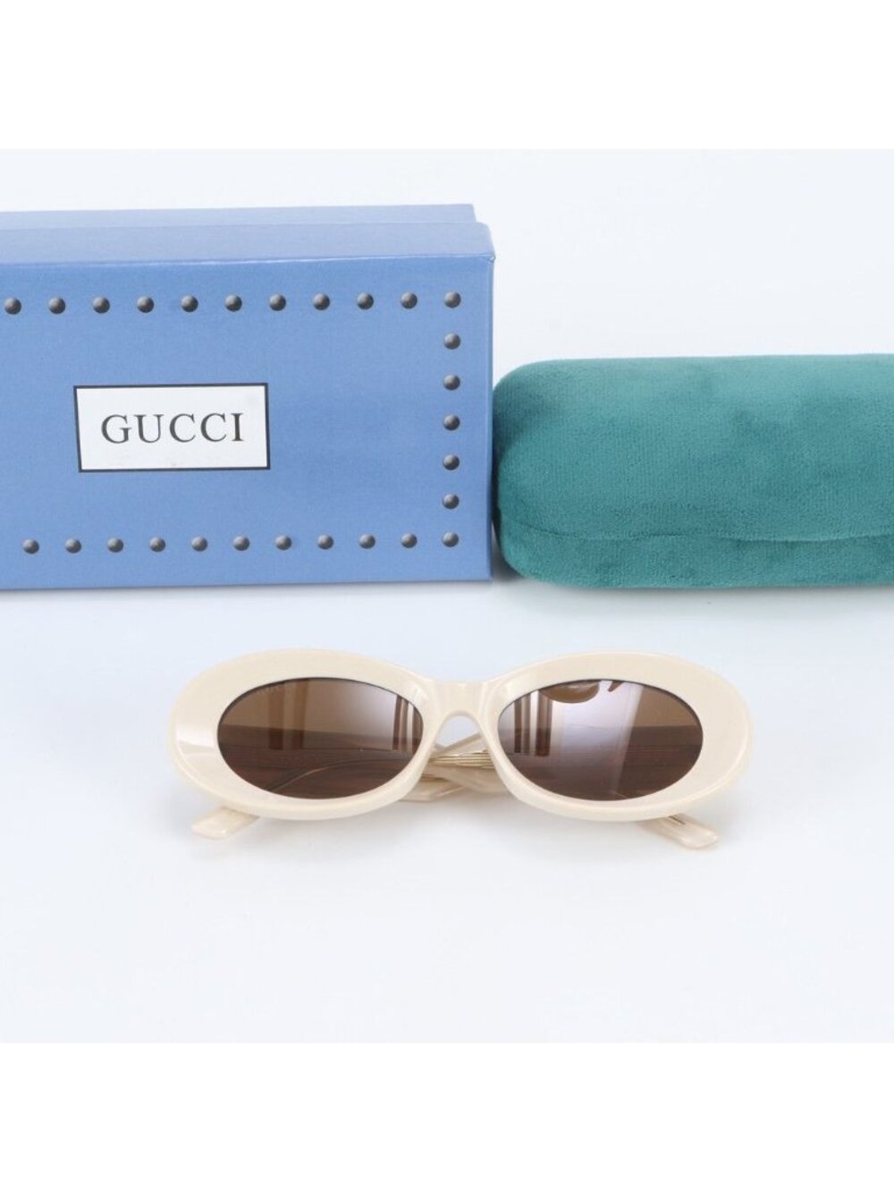 Gucci Oval Shape Sunglasses Eyewear
